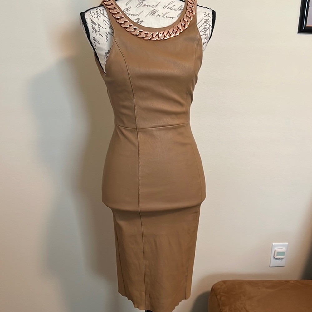 Beautiful camel dress leather like new use ones